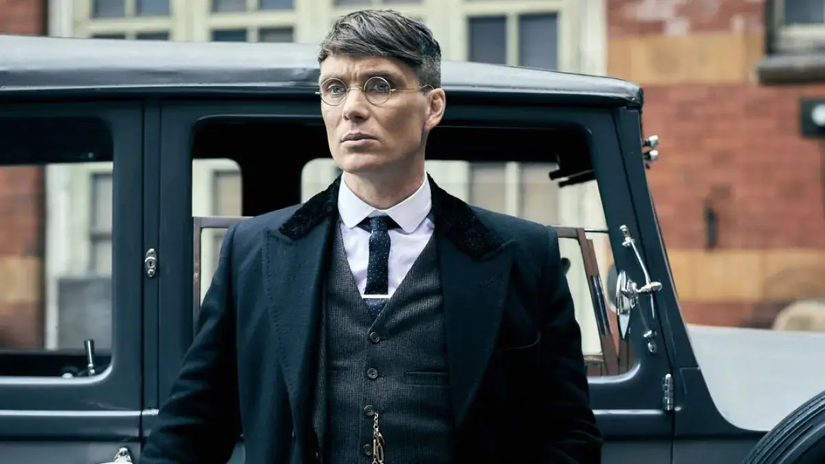 Thomas Shelby se demande comment créer un site vitrine qui reflète l'image de la Shelby Company et améliore sa visibilité sur le web.